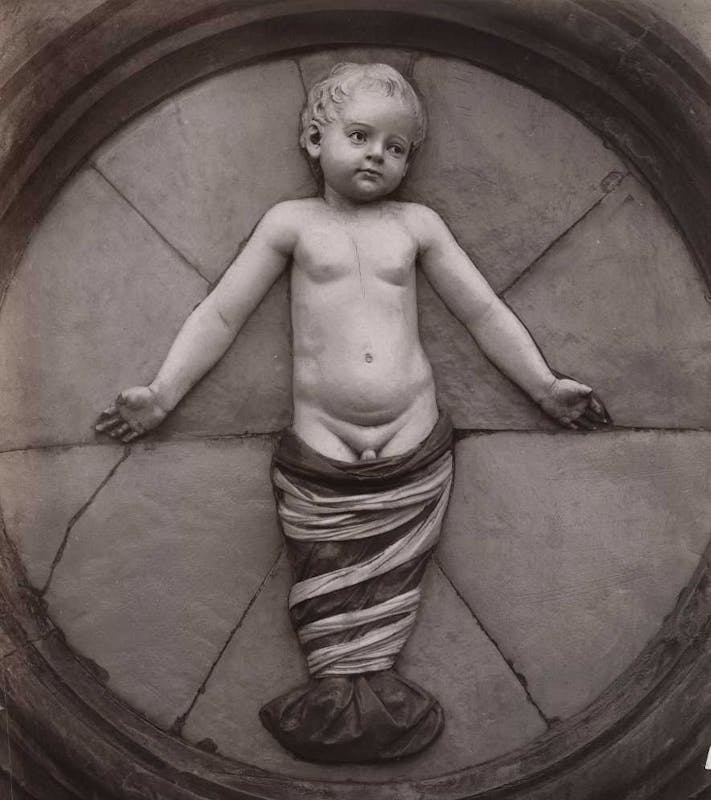 Fig. 3, Luca della Robbia, Putto, Loggia degli Innocenti