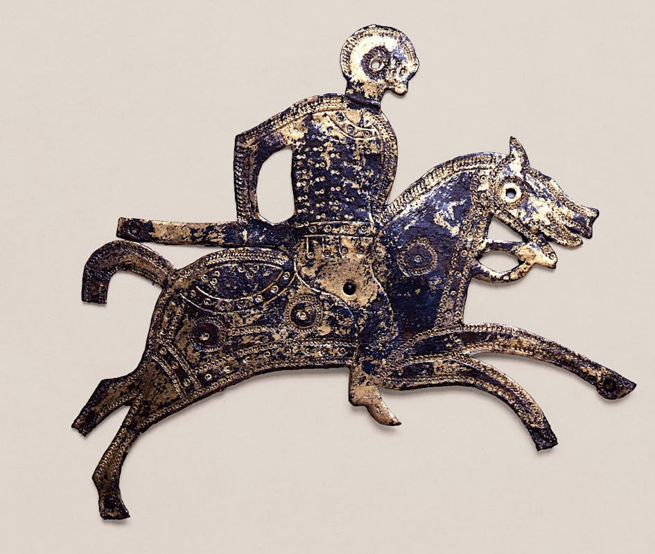 Placchetta di scudo raffigurante un cavaliere con lancia su cavallo, VII sec. d. C.