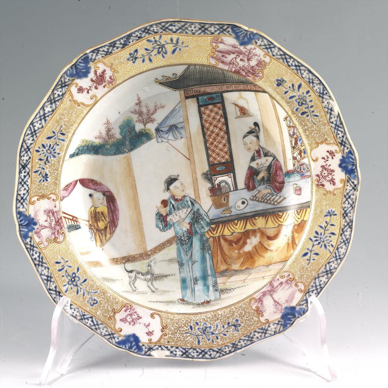Chinese plate with three figures and a small dog