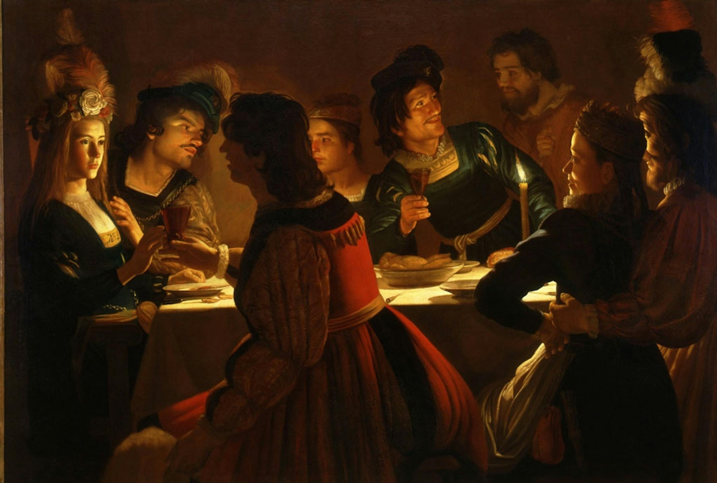 Gerrit van Honthorst detto Gherardo delle Notti (Utrecht 1592 - 1656), Banchetto a lume di candela, 1617 ca., olio su tela, Galleria degli Uffizi, Firenze.